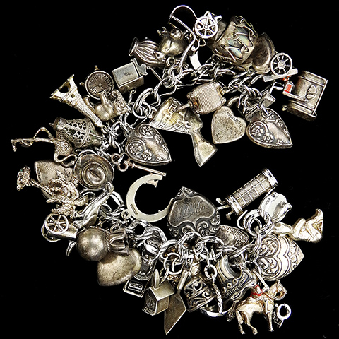 Sterling Miscellaneous Objects and Seven Puffy Hearts 45 Charm Bracelet